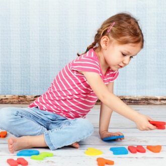 Cute,Preschool,Girl,Playing,With,Letters